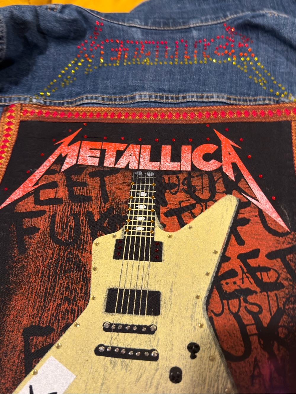 Metallica Jean Jacket with Back patch and hand placed rhinestones. Ribbon
